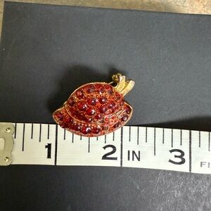 Red Hat brooch